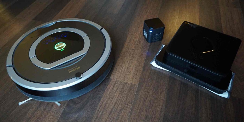 Zwei Roboter für alle Fälle: iRobot Roomba 780 (links) und iRobot Braava 380 mit Navigation Cube (rechts)